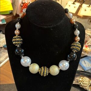 Elegant Beaded Necklace with Gold and Black Accents